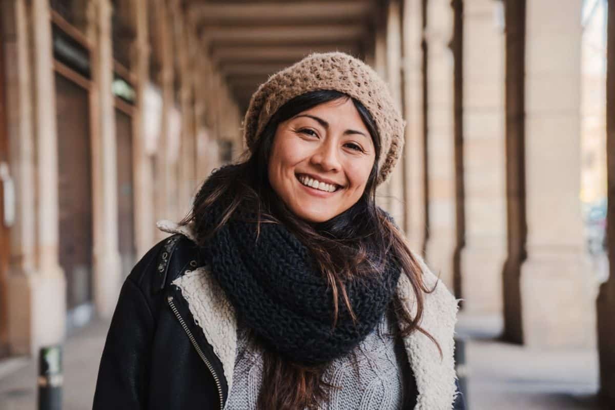 A confident person smiling with bright white teeth, making a great first impression.